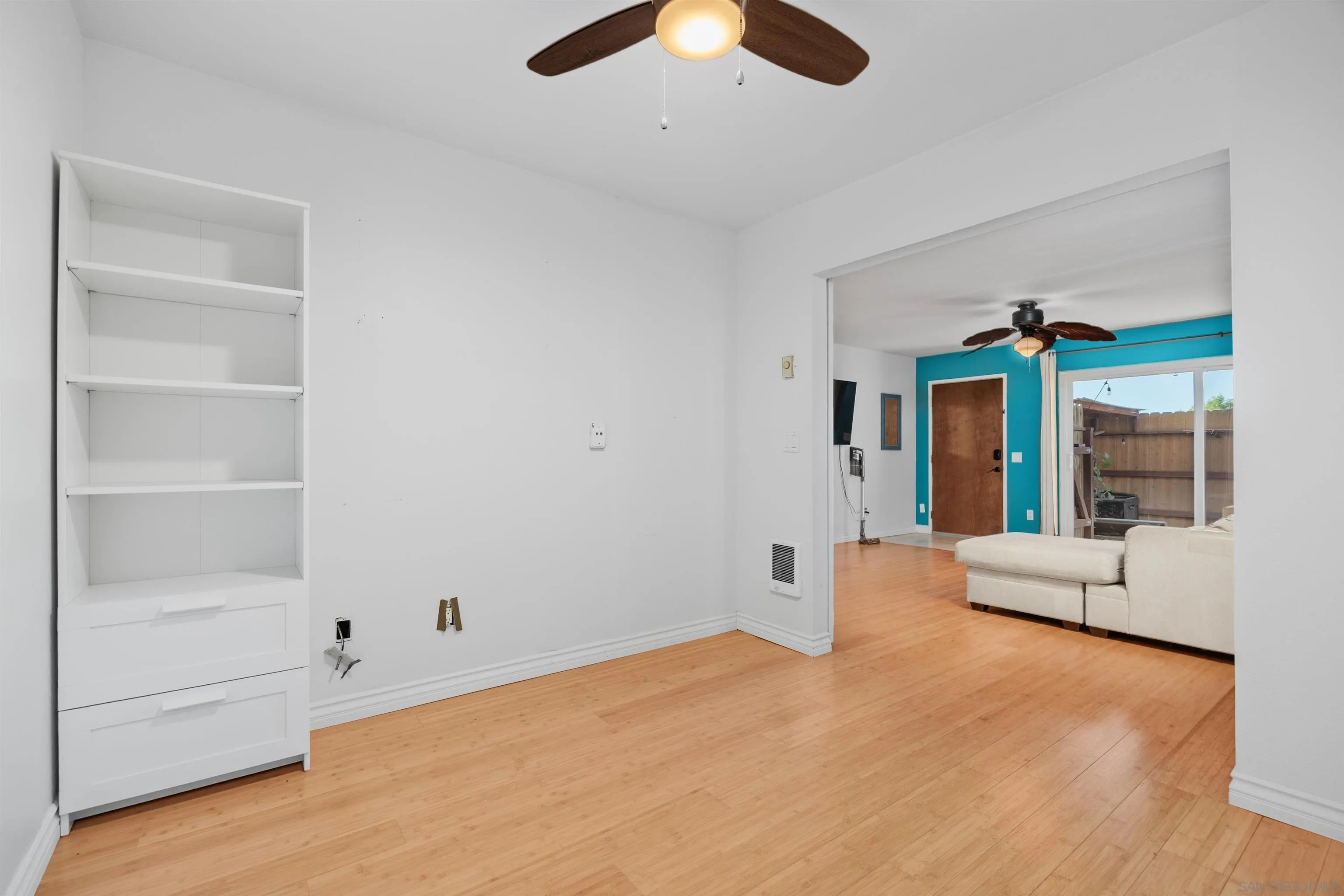 407 Requeza Street, Unit E9 Encinitas, CA 92024 - Photo 14 of 19 a view of an empty room with a window