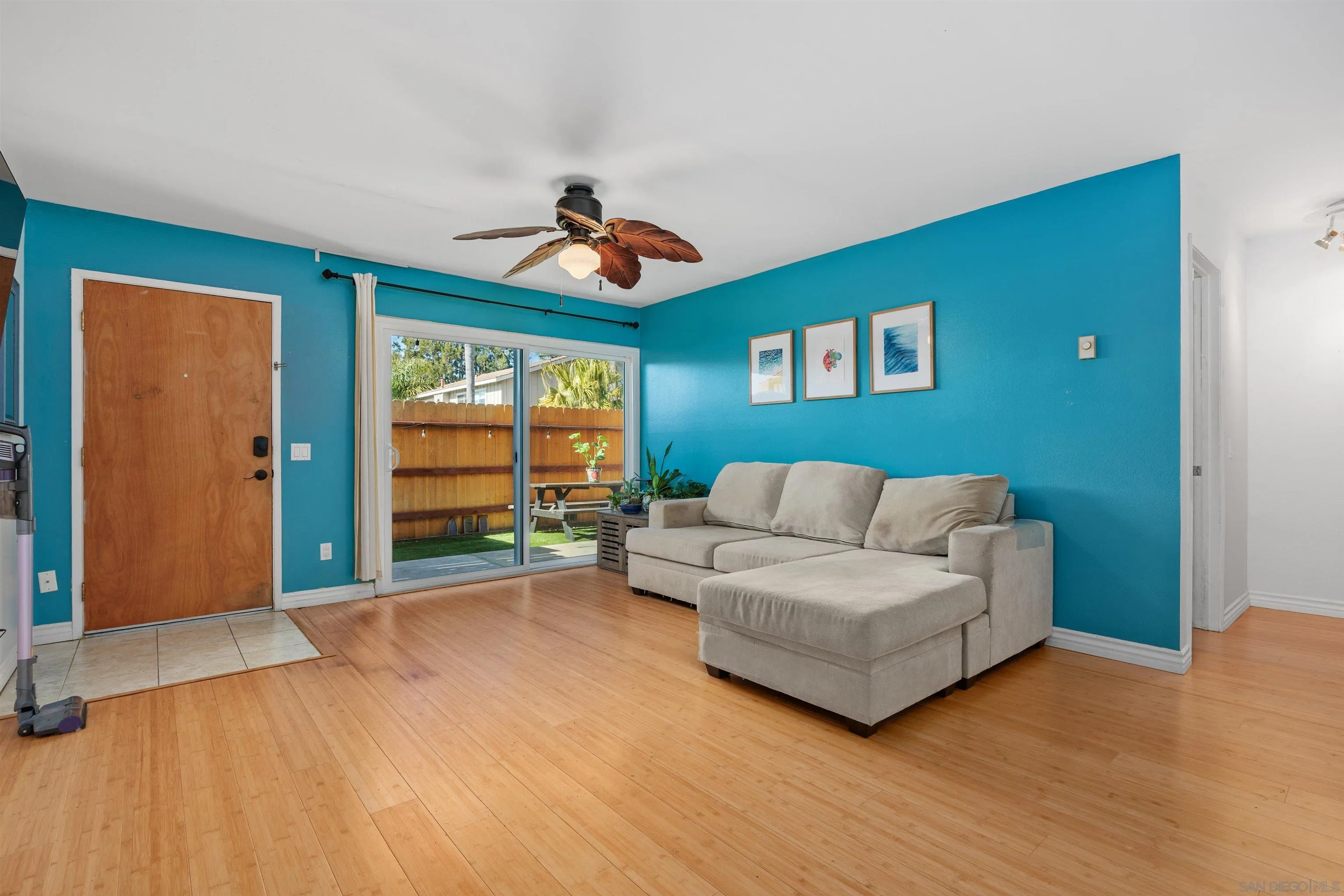 407 Requeza Street, Unit E9 Encinitas, CA 92024 - Photo 2 of 19 a living room with furniture and a window