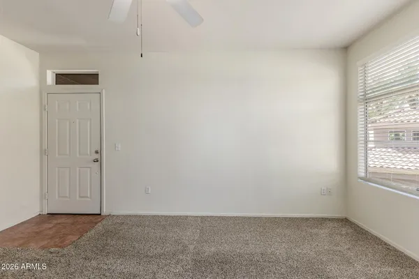 an empty room with windows