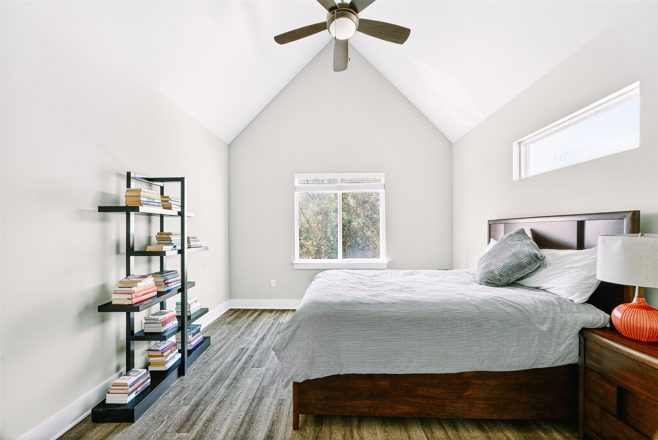 4917 Sunset Trail, Unit A Austin, TX 78745 - Photo 24 of 35 Bedroom featuring beam ceiling, wood finished floors, and ceiling fan