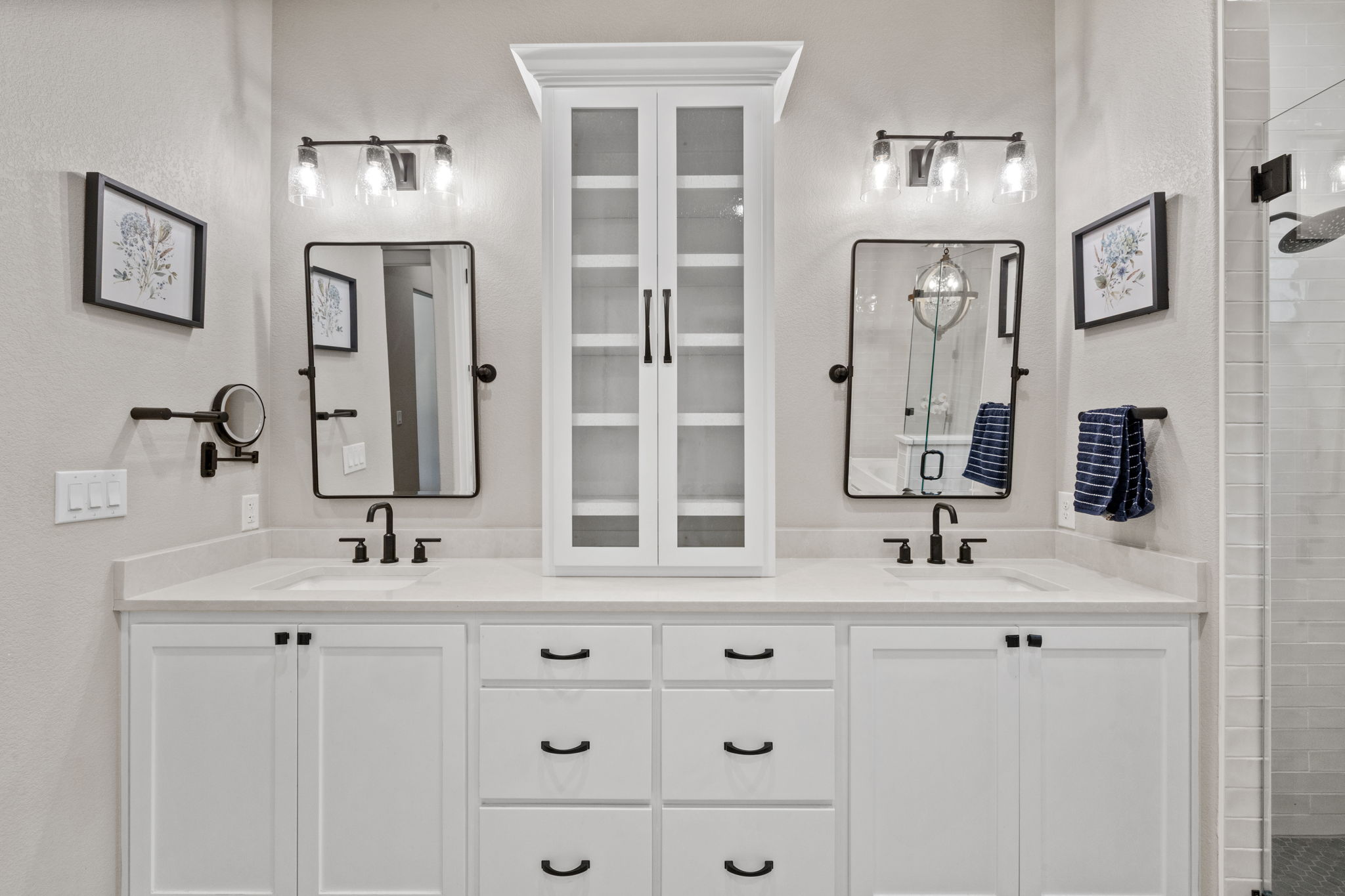 104 Lower Cedar Cove Georgetown, TX 78633 - Photo 18 of 37 a bathroom with double vanity sink and a mirror