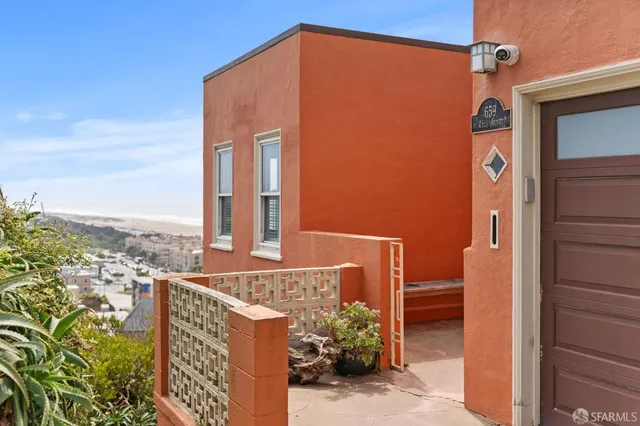 a view of an outdoor space with wooden floor