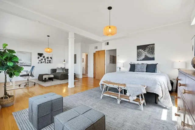 a view of a terrace with couches and potted plants
