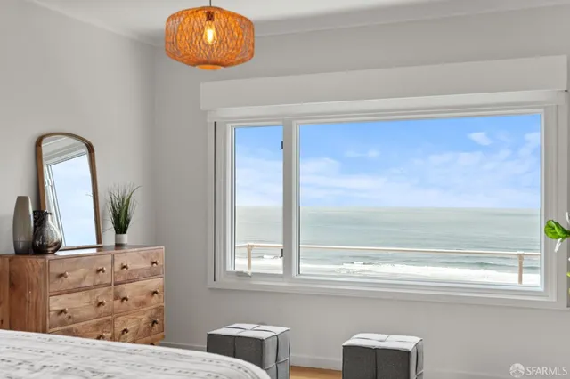 a view of a road with an ocean view