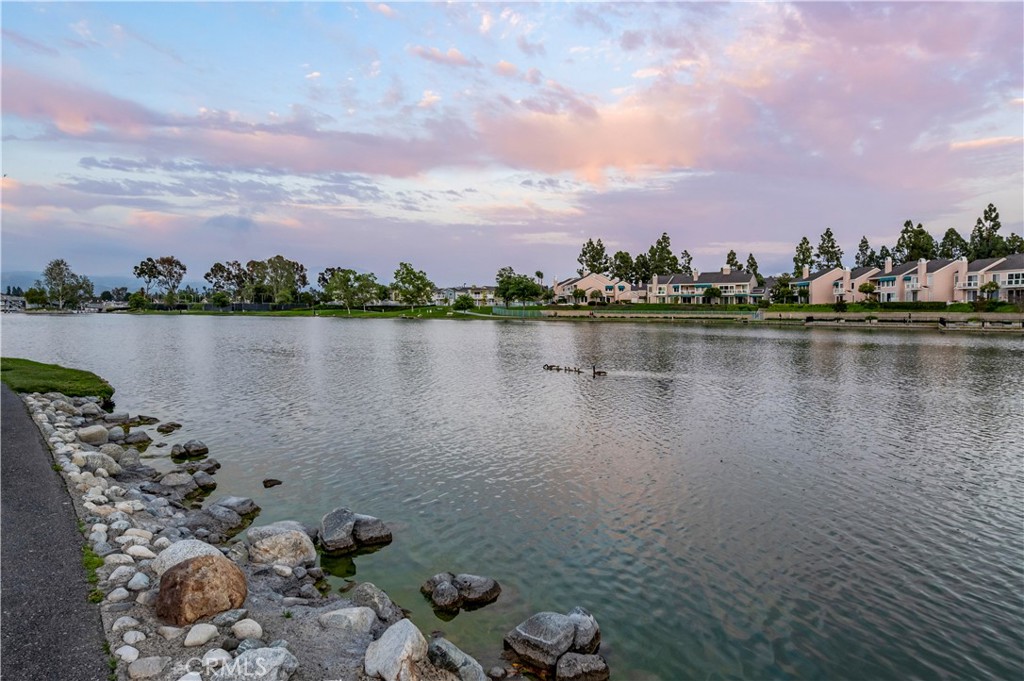 8 Sage Irvine, CA 92604 - Photo 24 of 32 a view of a lake with houses