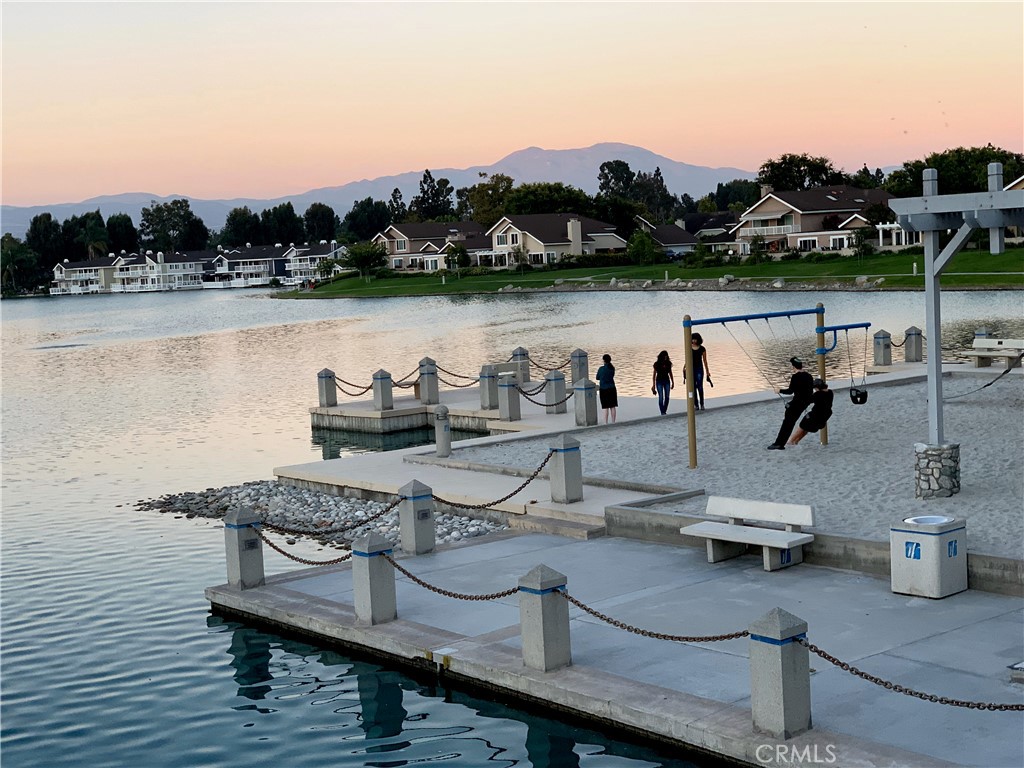 8 Sage Irvine, CA 92604 - Photo 25 of 32 a view of a lake with outdoor seating
