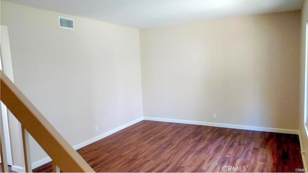 8 Sage Irvine, CA 92604 - Photo 3 of 32 a view of an empty room and wooden floor