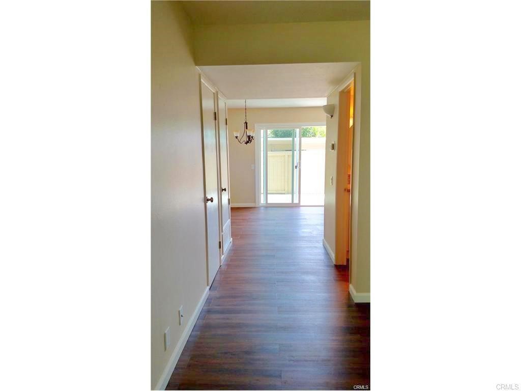 8 Sage Irvine, CA 92604 - Photo 7 of 32 a hallway with wooden floor