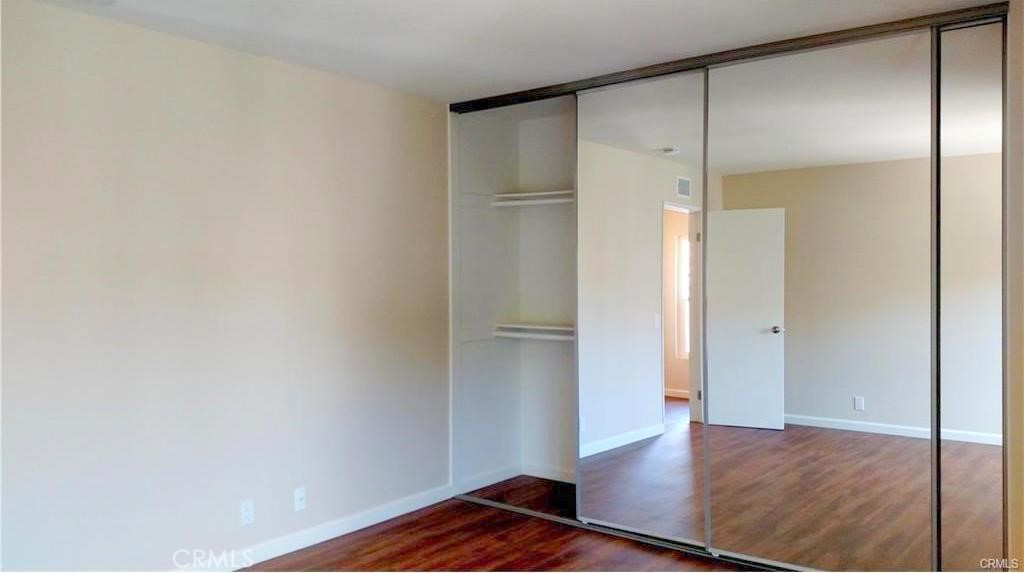 8 Sage Irvine, CA 92604 - Photo 8 of 32 a view of an empty room with wooden floor