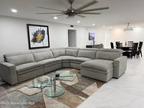 a bedroom with a bed and a table