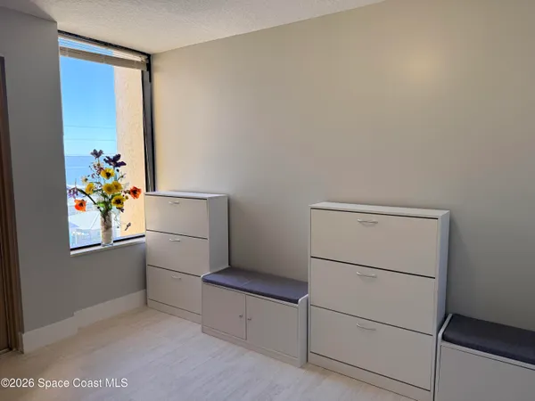 a stove top oven sitting inside of a kitchen