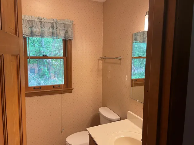 a bathroom with a toilet