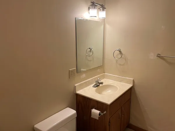 a bathroom with a glass door