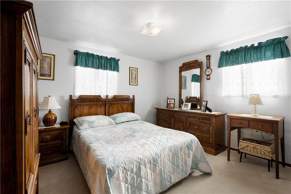 3157 Old Oakdale Road McDonald, PA 15057 - Photo 16 of 39 a room with a bed and a dresser in it