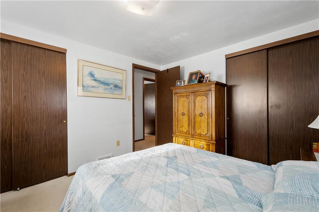 3157 Old Oakdale Road McDonald, PA 15057 - Photo 17 of 39 a bedroom with a bed and a mirror