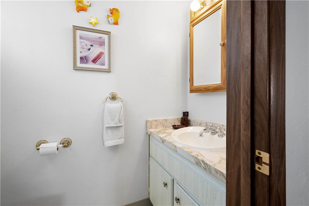 3157 Old Oakdale Road McDonald, PA 15057 - Photo 20 of 39 a bathroom with a sink and mirror