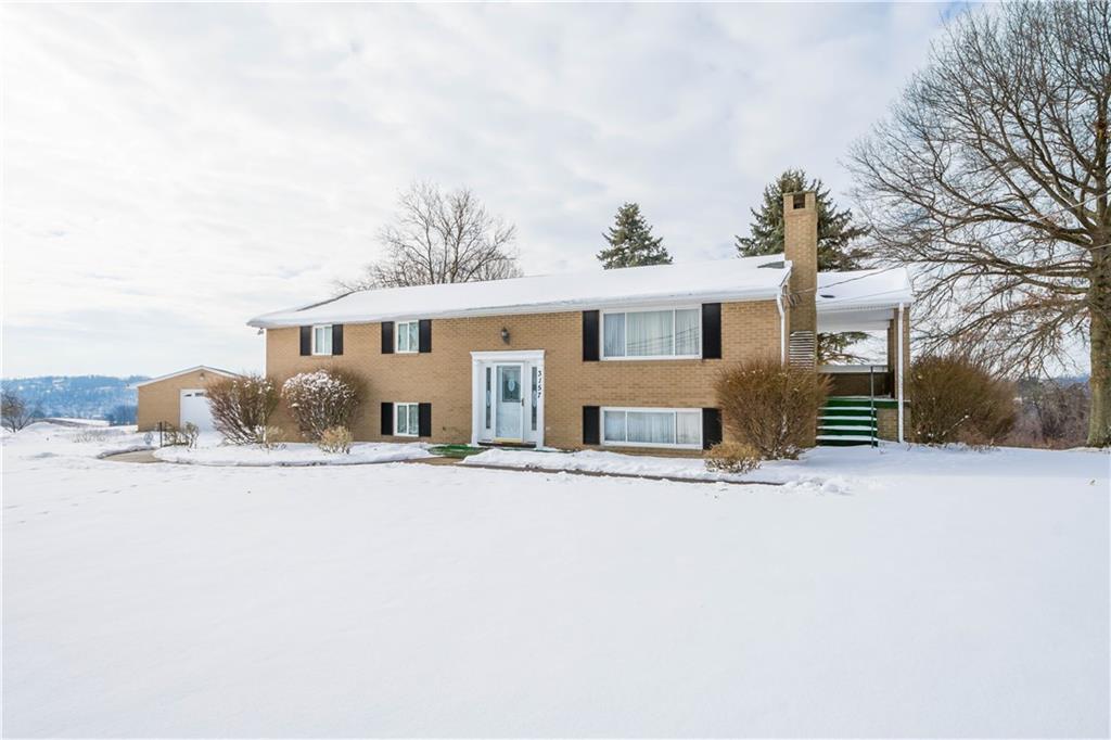 3157 Old Oakdale Road McDonald, PA 15057 - Photo 2 of 39 a front view of a house with a yard