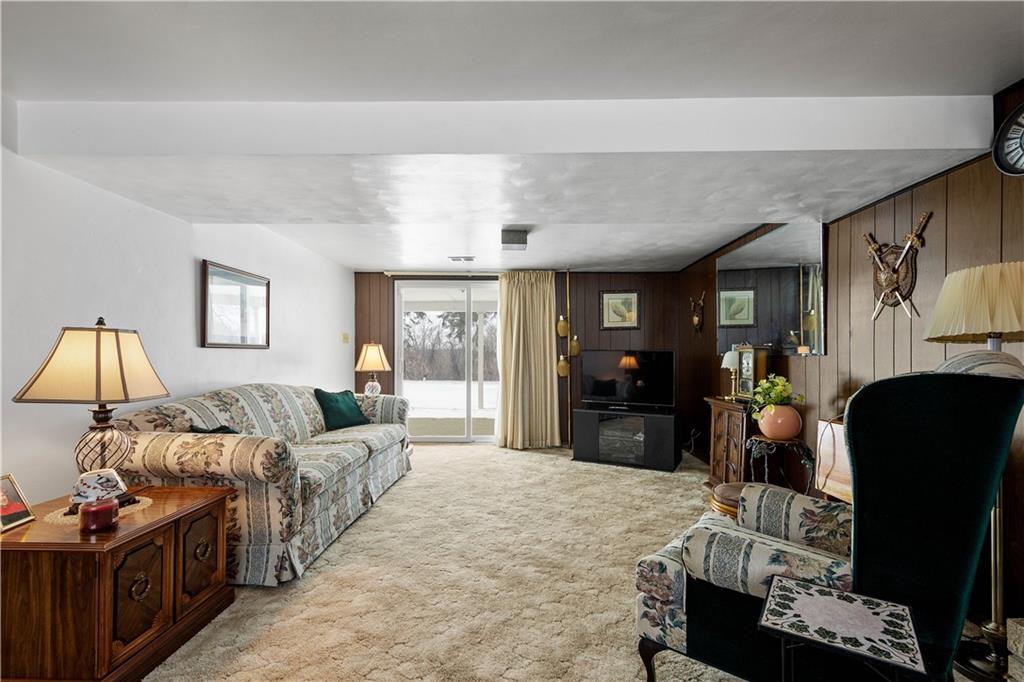 3157 Old Oakdale Road McDonald, PA 15057 - Photo 23 of 39 a bedroom with furniture and a fireplace
