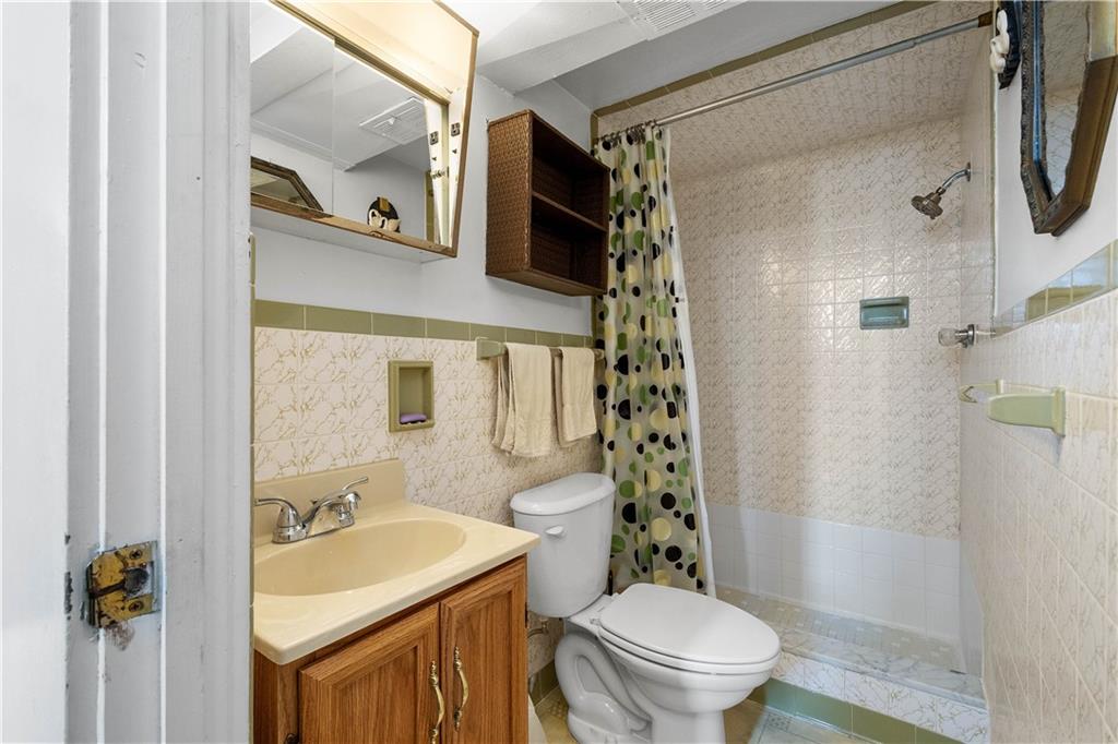 3157 Old Oakdale Road McDonald, PA 15057 - Photo 25 of 39 a bathroom with a sink toilet and shower
