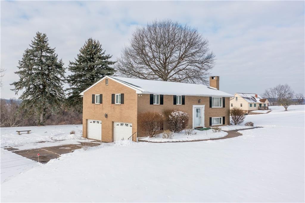 3157 Old Oakdale Road McDonald, PA 15057 - Photo 4 of 39 a view of a house with a yard covered in snow