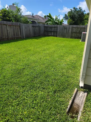 a view of a backyard with a garden