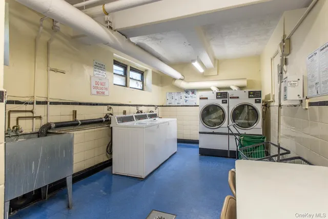 a kitchen with stainless steel appliances a white cabinet and a sink