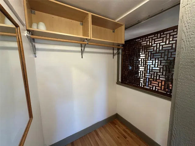 a view of a room with racks on the wall