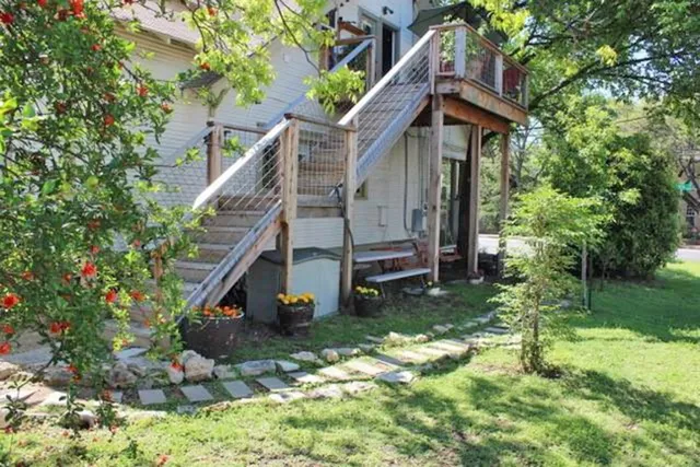 a backyard of a house with lots of green space