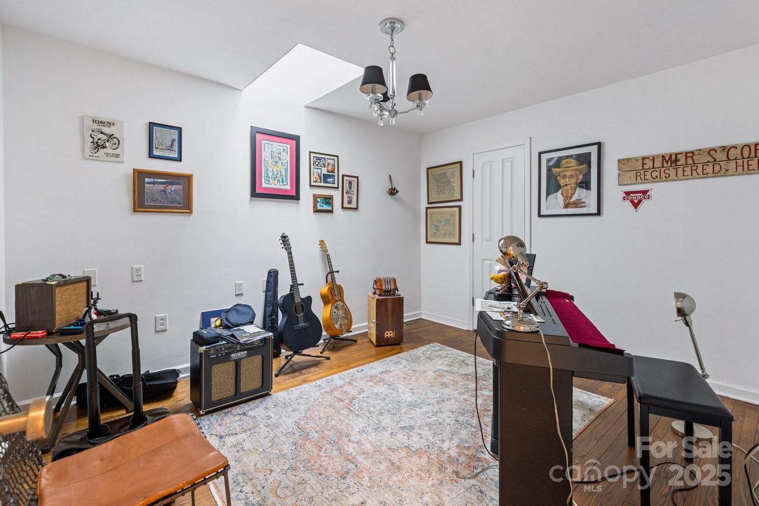 15 Busbee Road Biltmore Forest, NC 28803 - Photo 18 of 24 a view of a livingroom with furniture and gym equipment