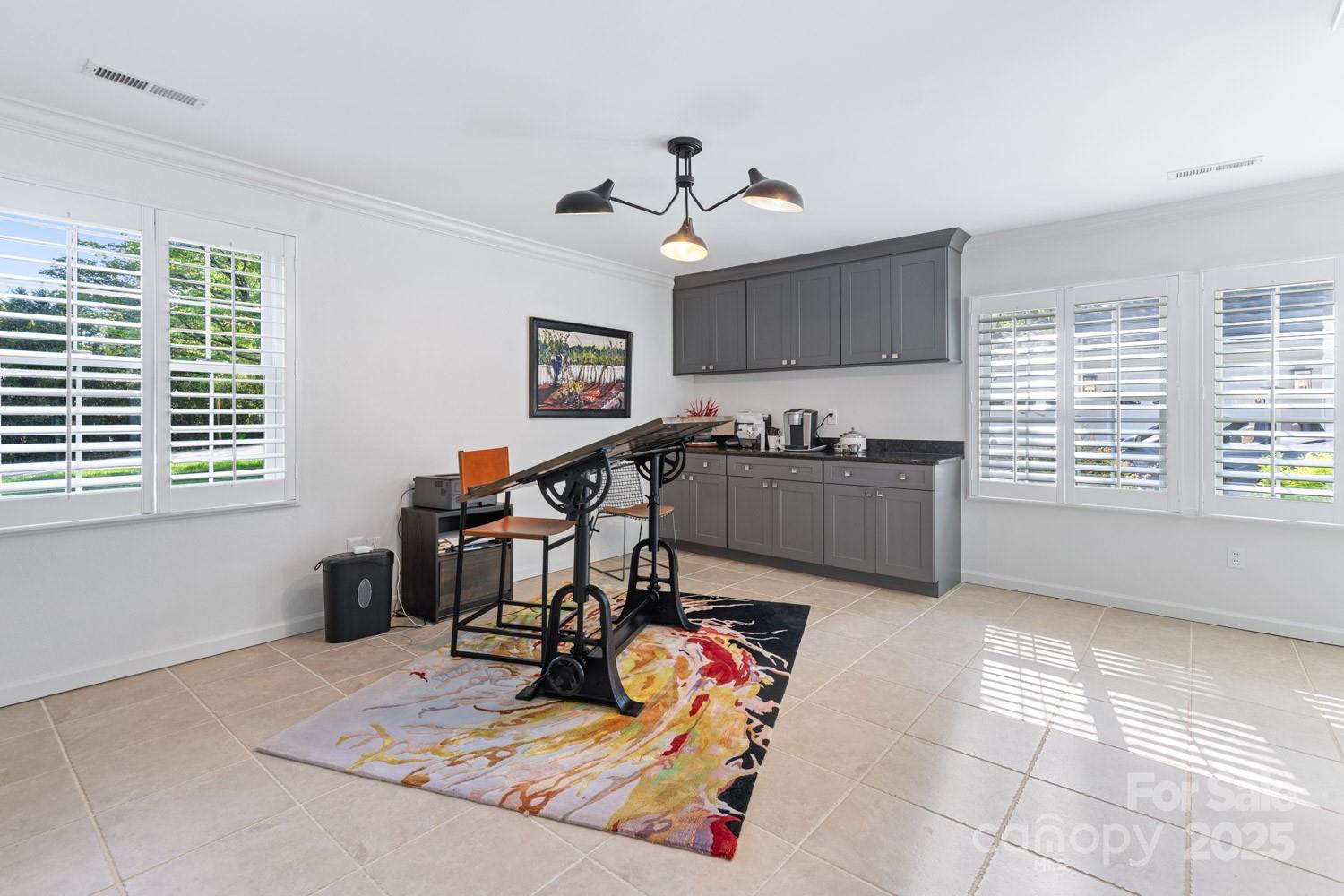 15 Busbee Road Biltmore Forest, NC 28803 - Photo 19 of 24 a view of a workspace with furniture and a window