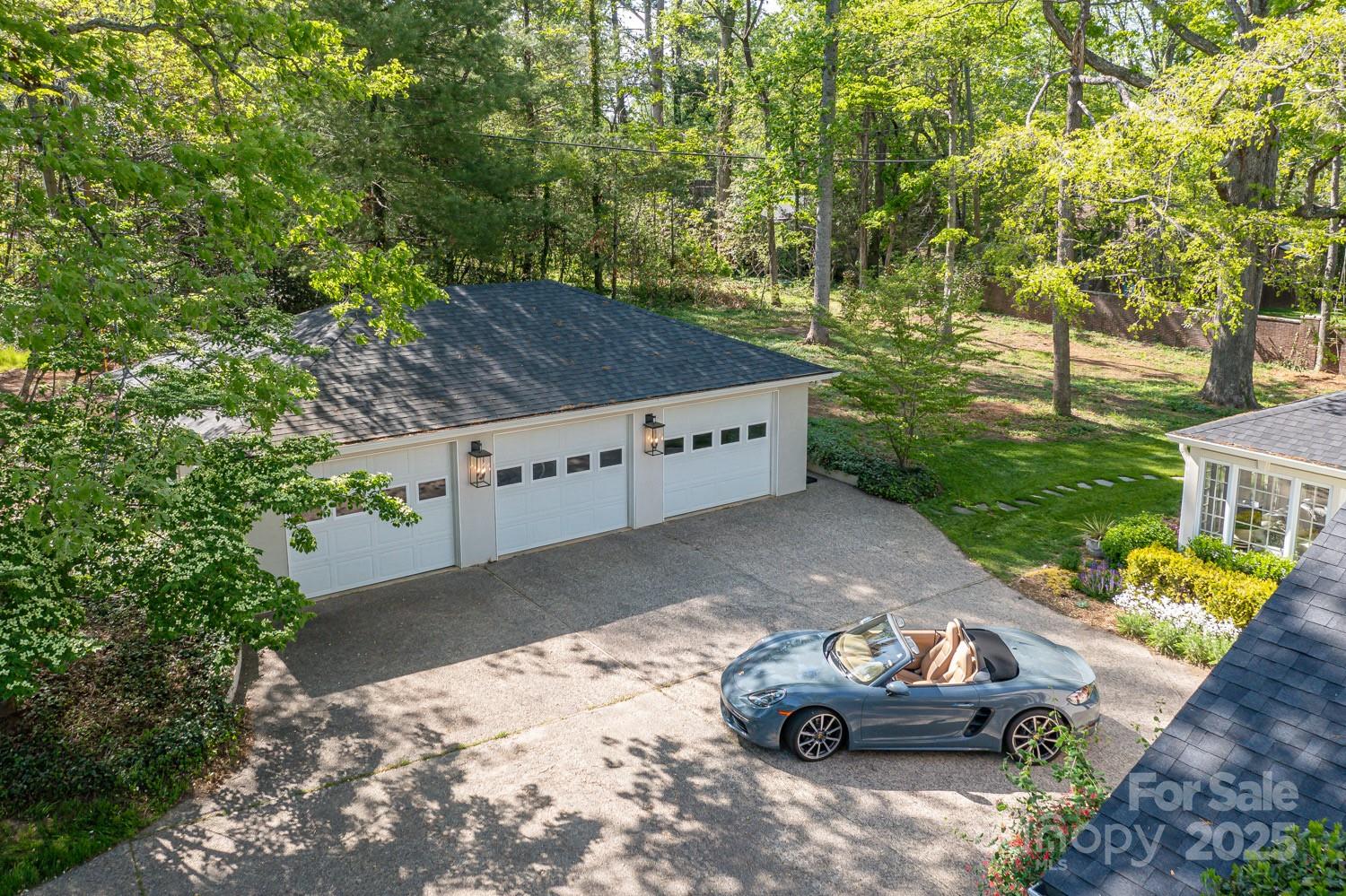 15 Busbee Road Biltmore Forest, NC 28803 - Photo 23 of 24 a front view of a house with garden