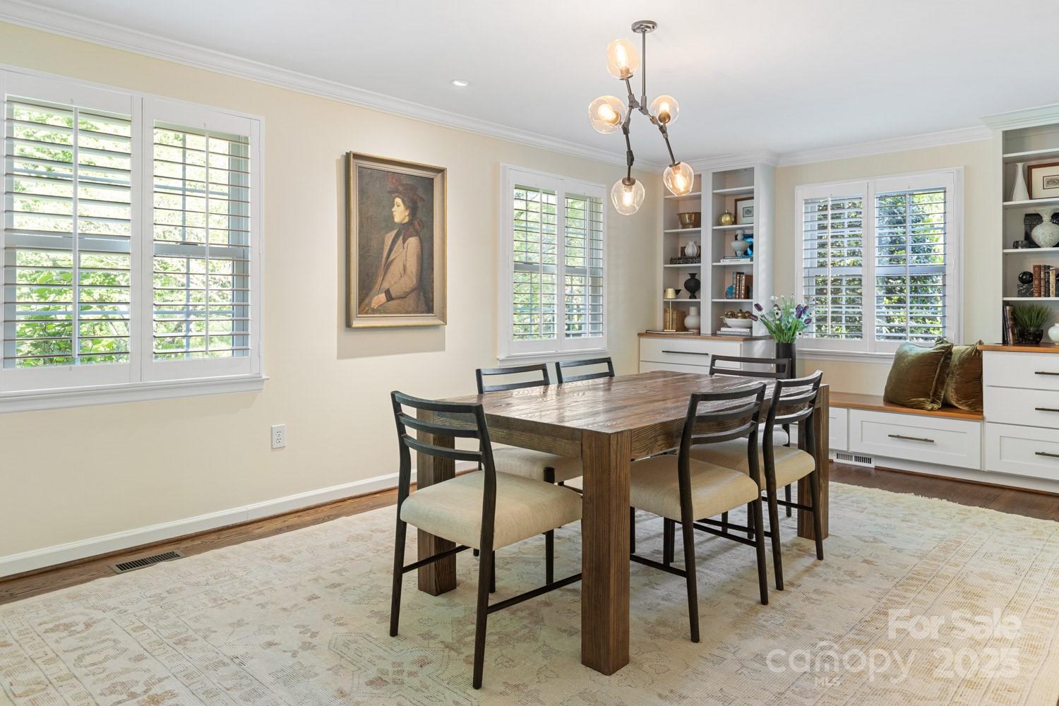 15 Busbee Road Biltmore Forest, NC 28803 - Photo 4 of 24 a view of a dining room with furniture window and outside view