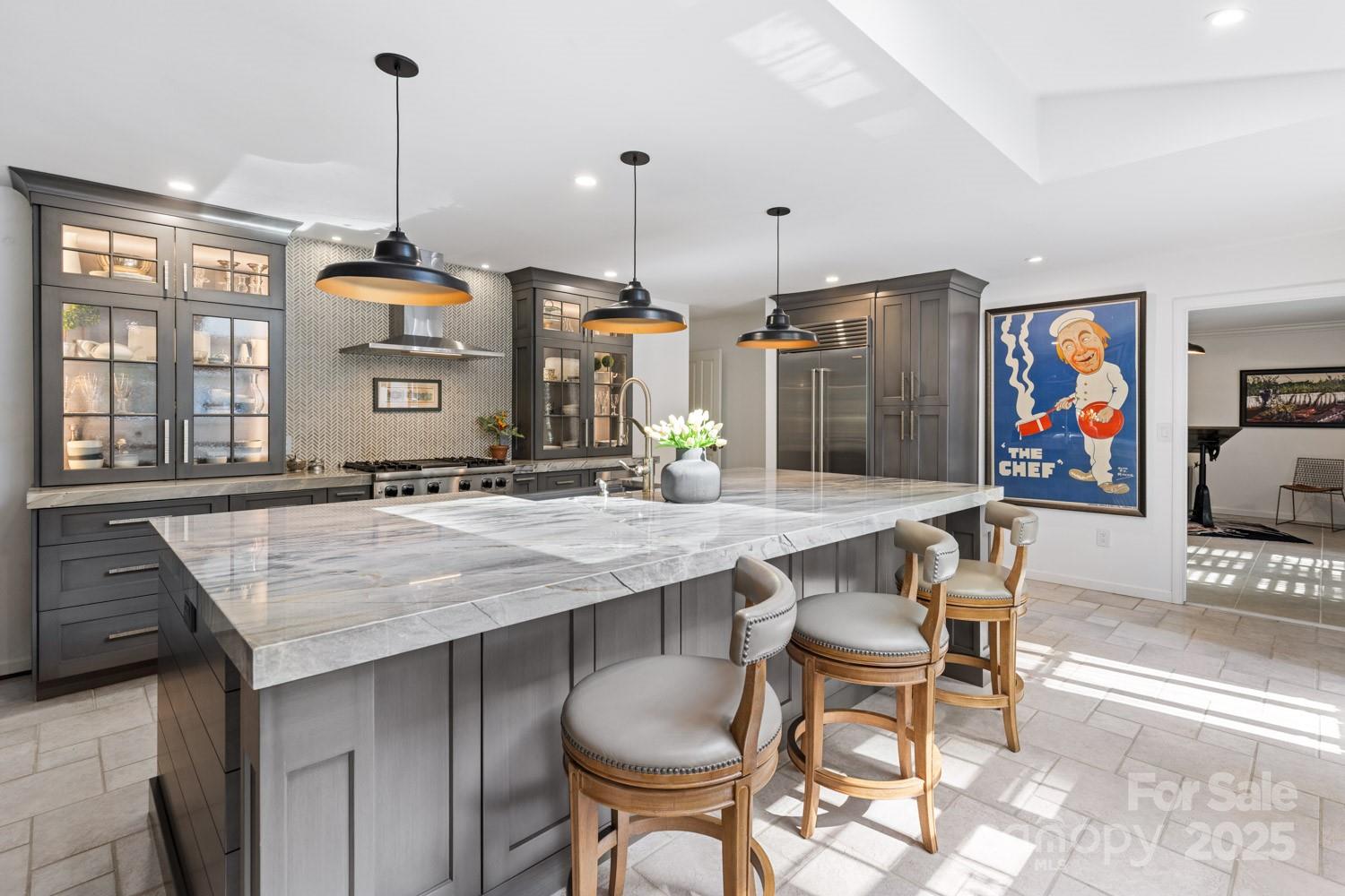 15 Busbee Road Biltmore Forest, NC 28803 - Photo 8 of 24 a dining table chairs and a chandelier