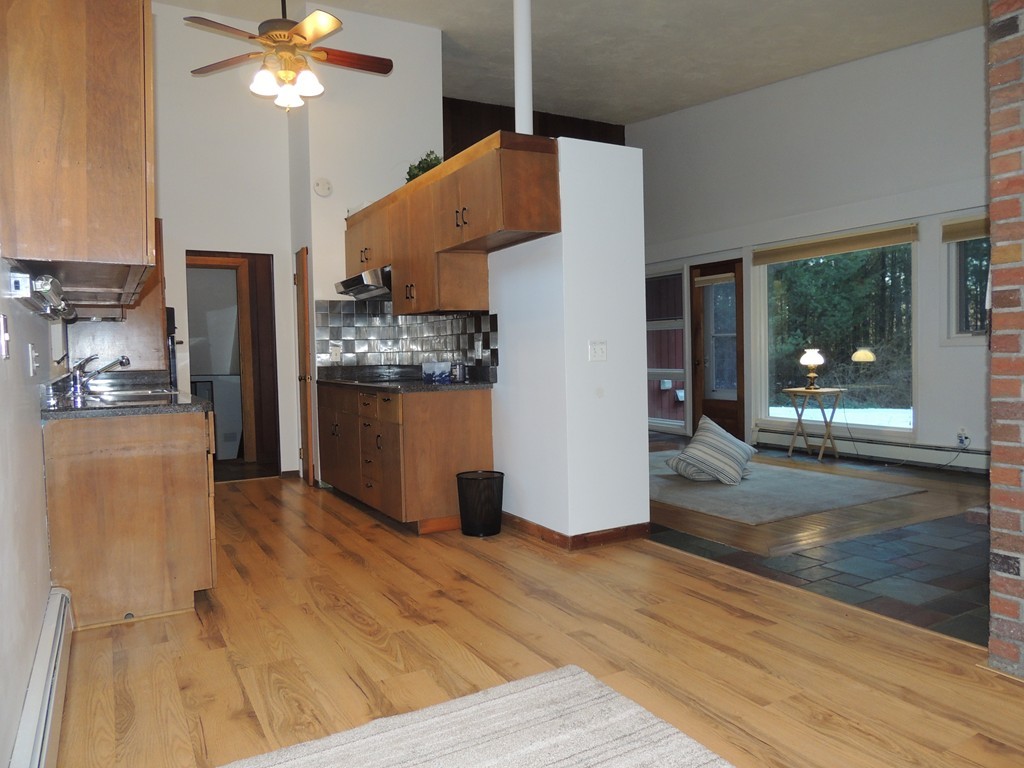 25 Algonquin Road Canton, MA 02021 - Photo 2 of 9 a view of a kitchen from the hallway