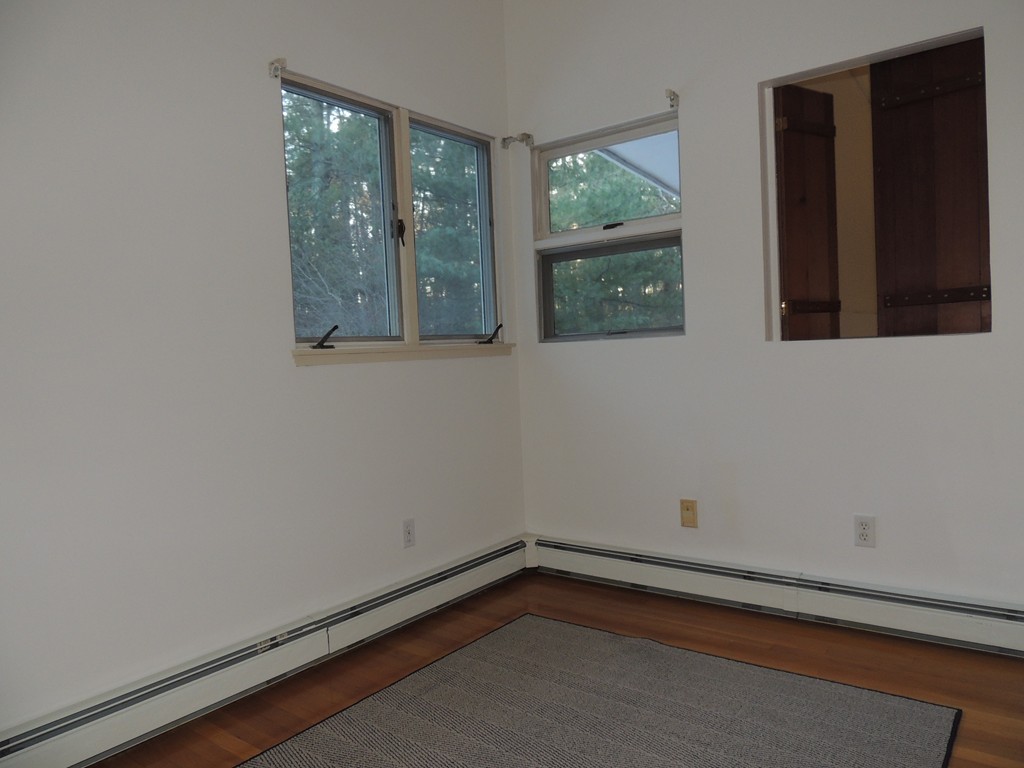 25 Algonquin Road Canton, MA 02021 - Photo 8 of 9 a view of an empty room with a window