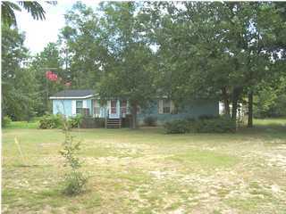 6111 Old Hickory Road Crestview, FL 32539 - Photo 1 of 4 a view of a house with a yard