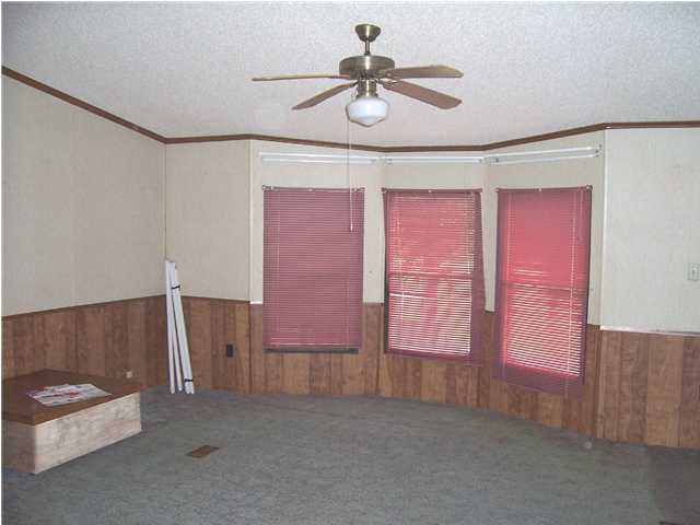 6111 Old Hickory Road Crestview, FL 32539 - Photo 4 of 4 a view of an empty room with a window