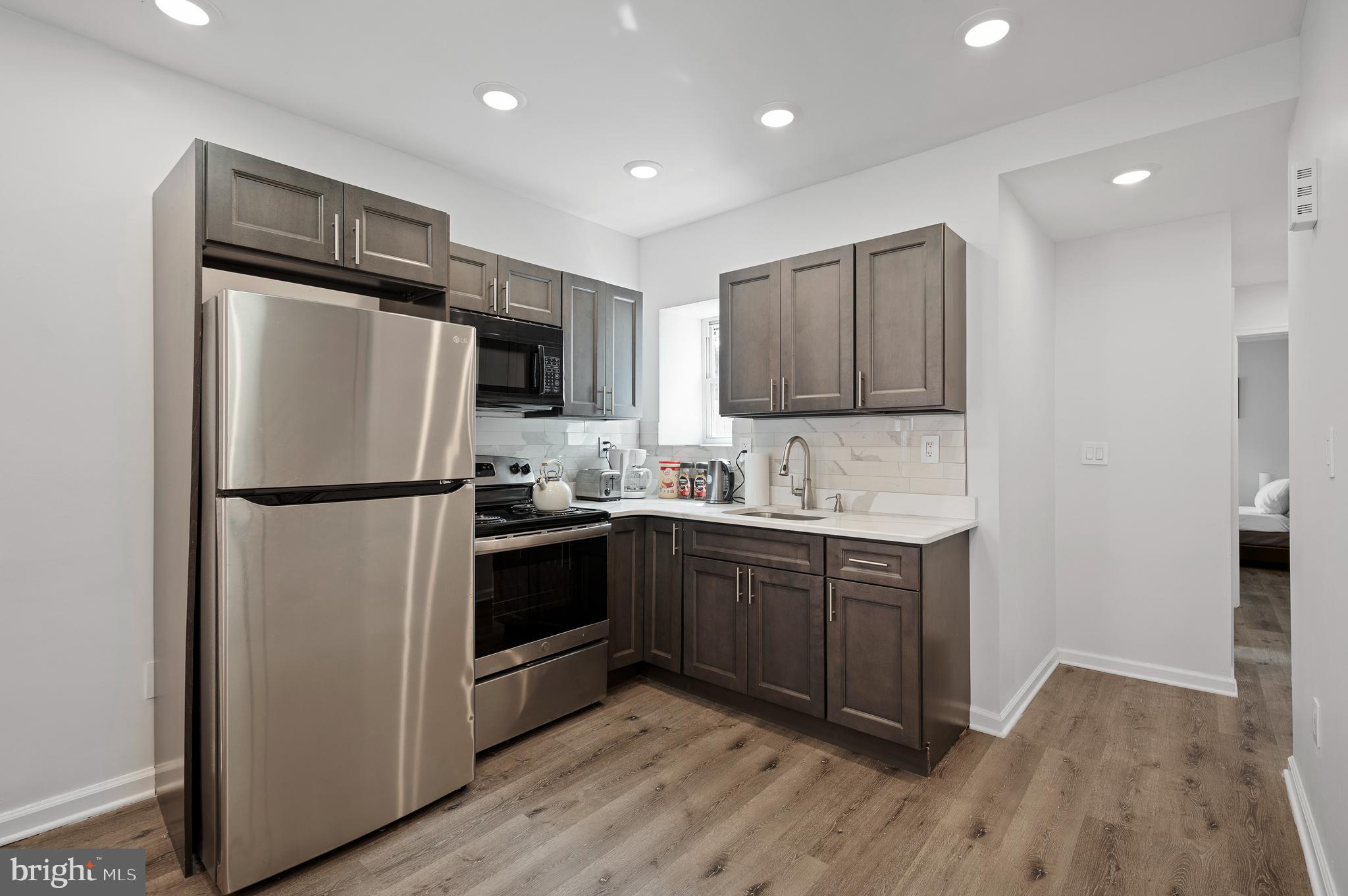 1816 Judson Street Philadelphia, PA 19121 - Photo 10 of 25 Great kitchen with deep charcoal cabinetry
