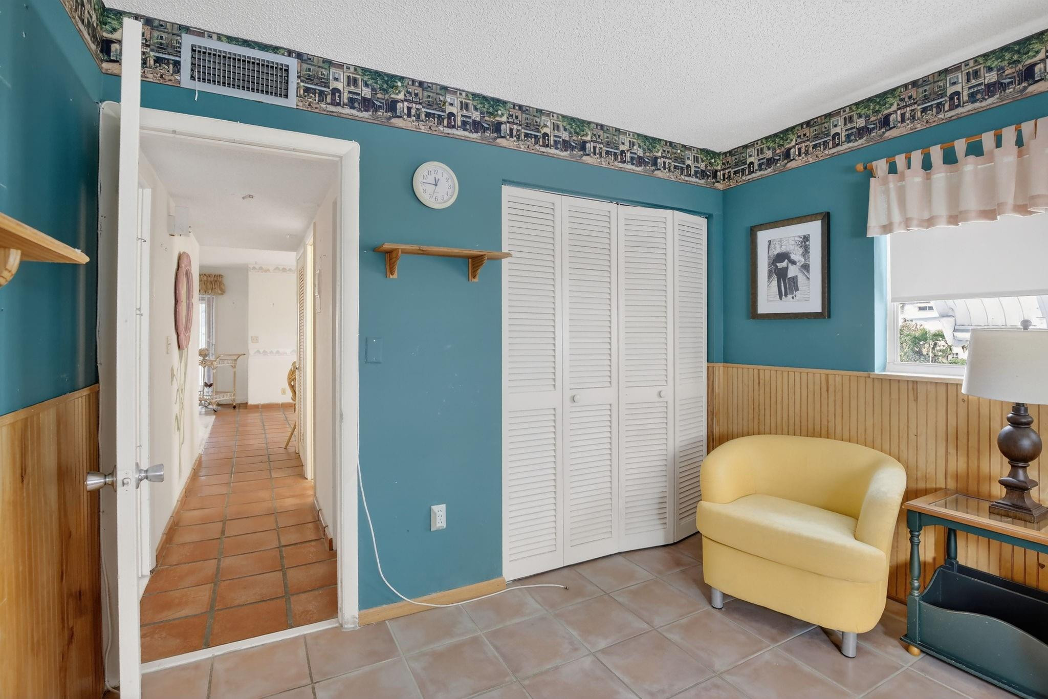 5300 Washington Street, Unit I201 Hollywood, FL 33021 - Photo 19 of 35 a living room with furniture and a rug
