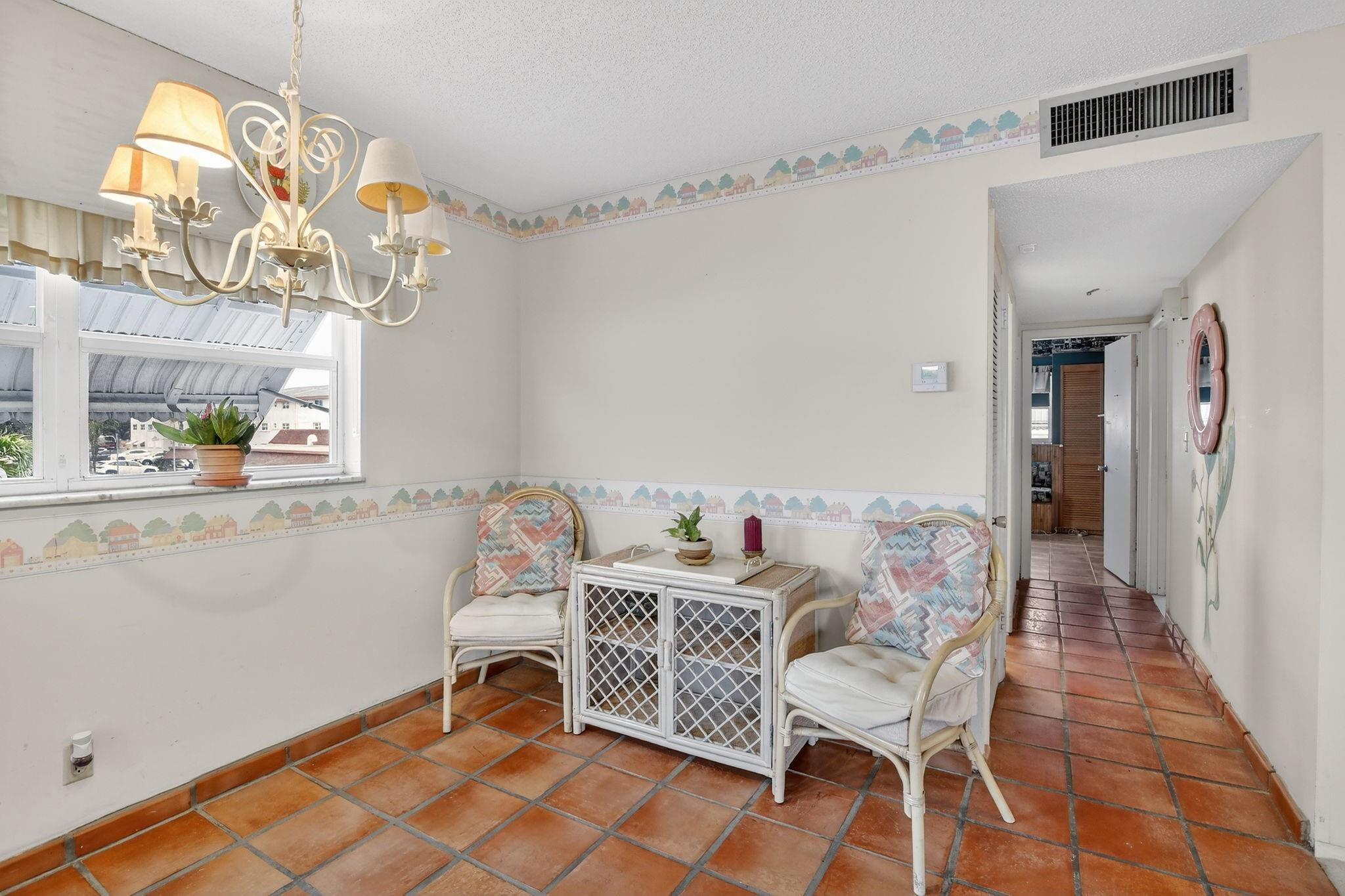 5300 Washington Street, Unit I201 Hollywood, FL 33021 - Photo 7 of 35 a bedroom with furniture and a window