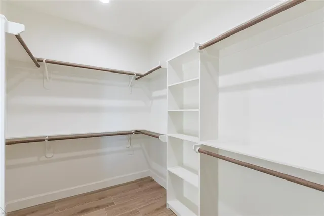 a view of an empty walk in closet