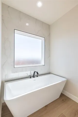 a bathroom with a bathtub