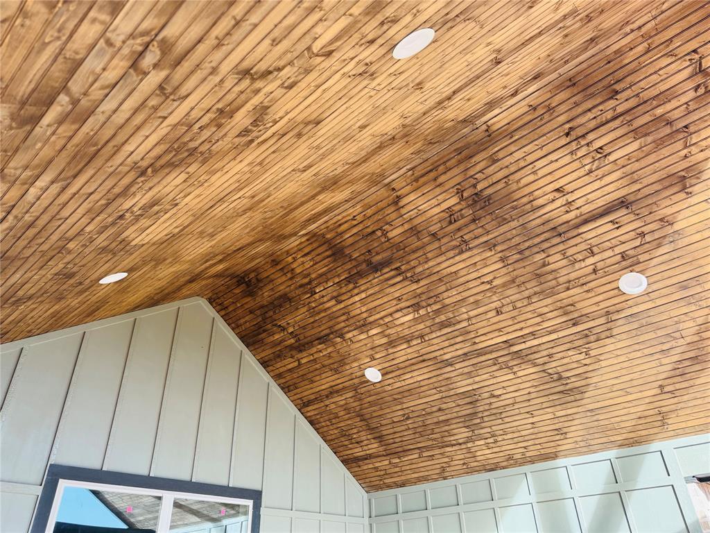 245 Indian Ridge Road Tuscola, TX 79562 - Photo 7 of 21 Detailed view of wood ceiling, a decorative wall, and recessed lighting