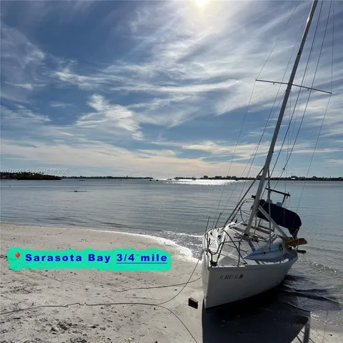 a view of a balcony with two chairs