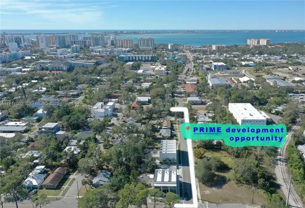 an aerial view of residential building and street