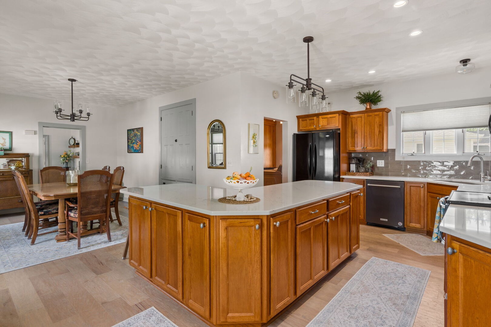 417 North State Street Geneseo, IL 61254 - Photo 6 of 51 a kitchen with stainless steel appliances kitchen island granite countertop a sink a stove and a dining table