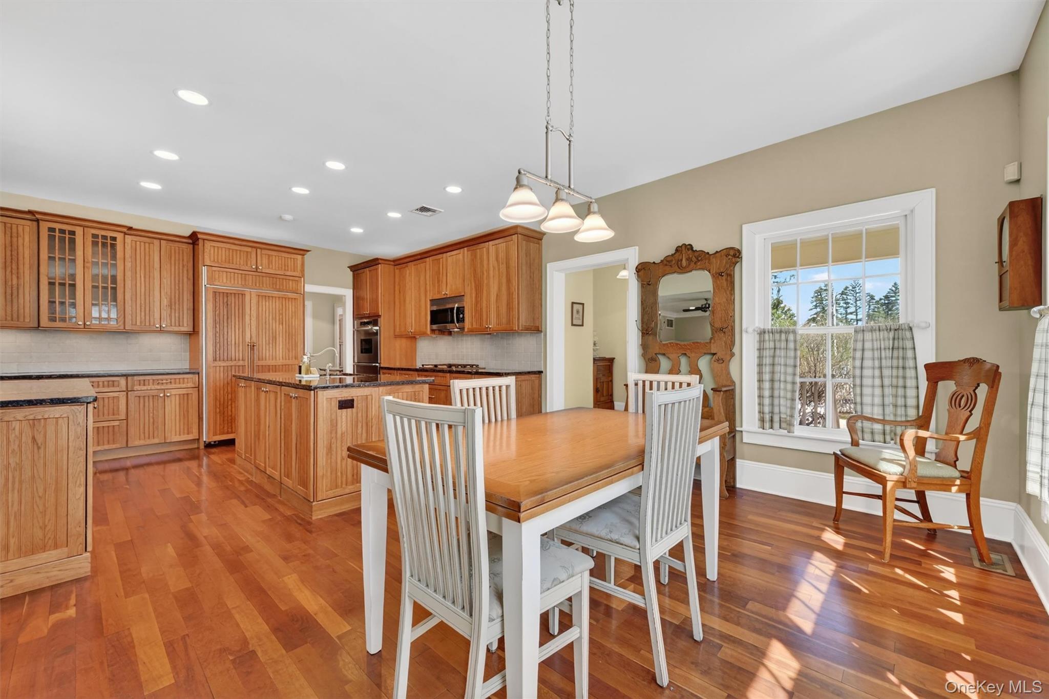 3 Clinton Ave Extension Warwick, NY 10990 - Photo 15 of 40 a view of a dining room with furniture and wooden floor