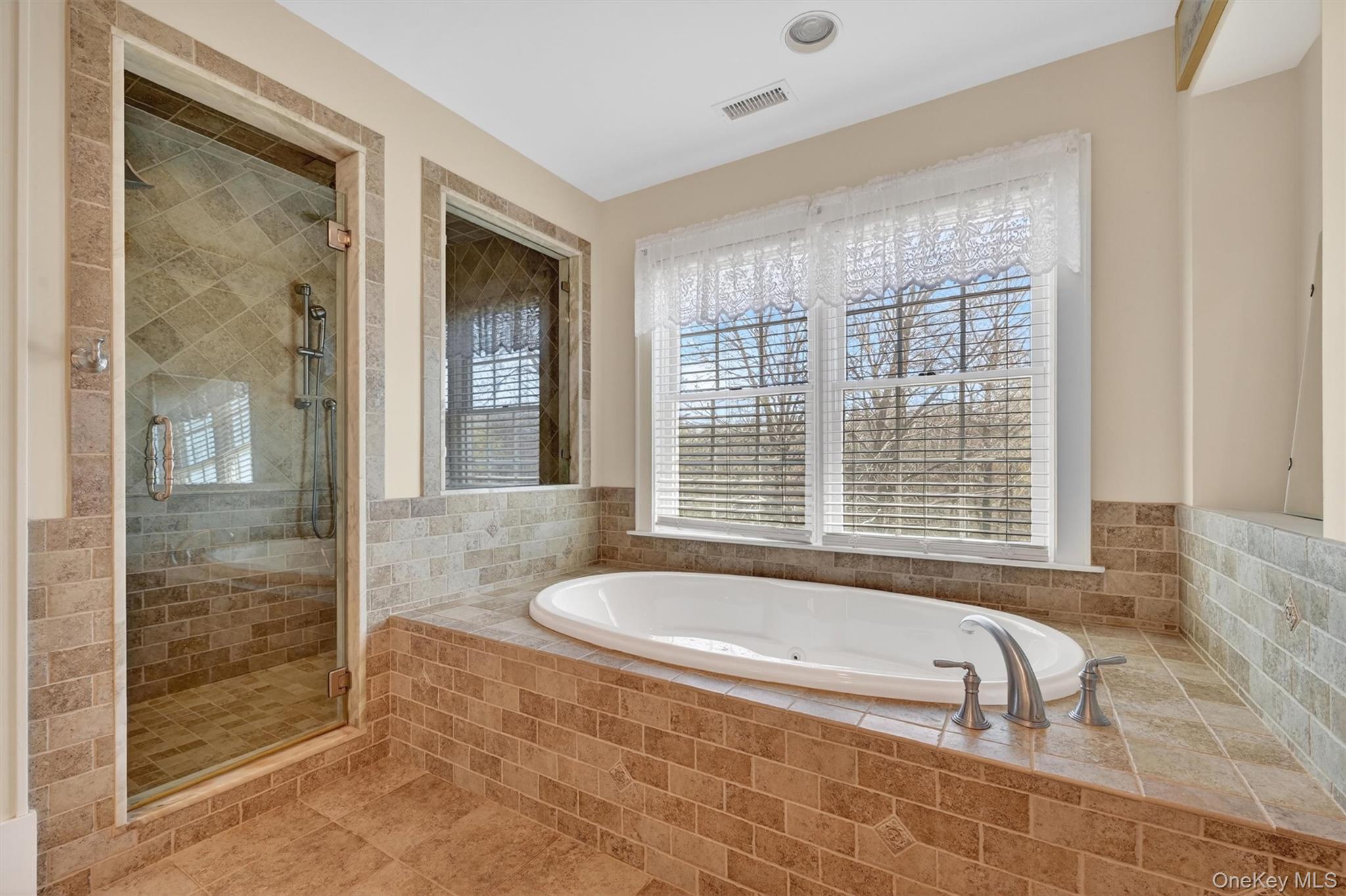 3 Clinton Ave Extension Warwick, NY 10990 - Photo 26 of 40 a bathroom with bathtub and a shower