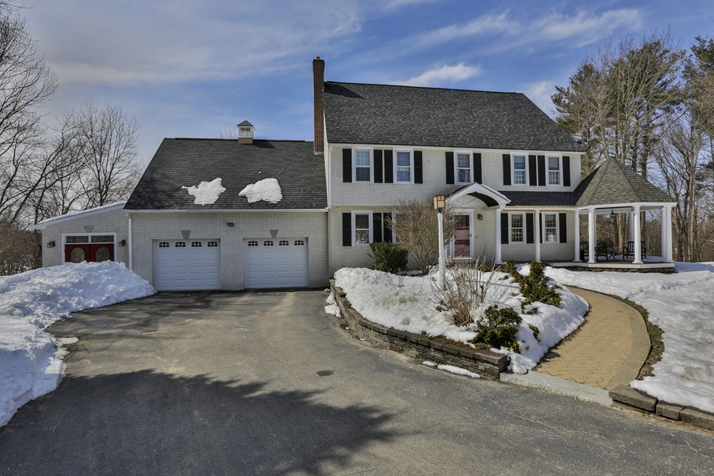 1 Carleton Road Groveland, MA 01834 - Photo 1 of 30 a front view of a house with a yard