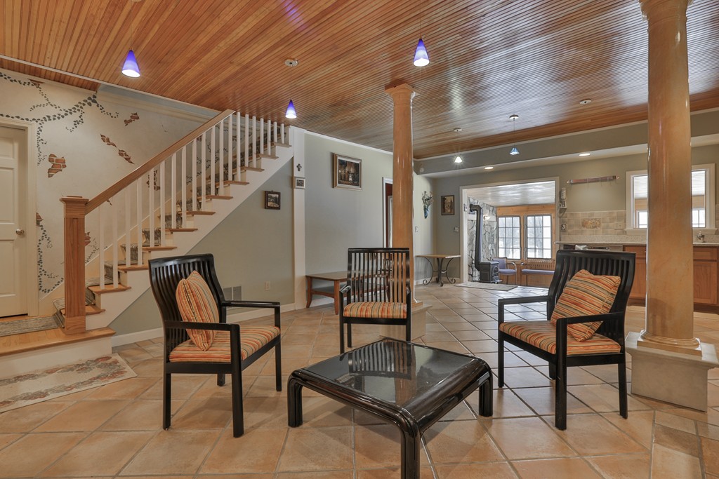 1 Carleton Road Groveland, MA 01834 - Photo 18 of 30 a outdoor space with lots of chairs and mirrors